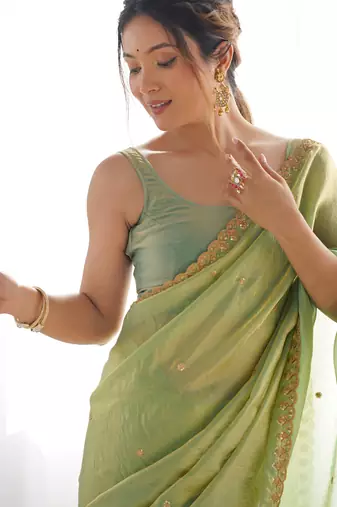 pista tissue embridered saree with unstitched blouse piece