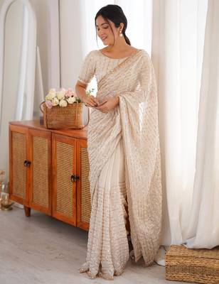 cream tissue embridered saree with unstitched blouse piece 1