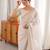 cream tissue embridered saree with unstitched blouse piece