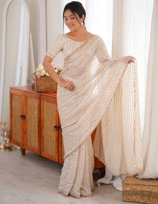 cream tissue embridered saree with unstitched blouse piece 3