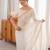 cream tissue embridered saree with unstitched blouse piece
