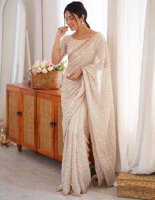 cream tissue embridered saree with unstitched blouse piece 5