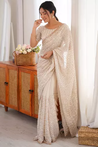 cream tissue embridered saree with unstitched blouse piece
