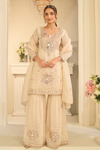 Cream silk blend with real mirror with sequence hand work kurta sharara with dupatta