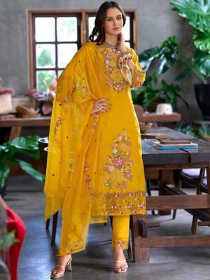Women floral embroidered panelled sequinned kurta with trousers & with dupatta 4