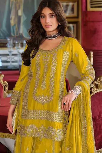 Women ethnic motifs embroidered regular thread work kurta with sharara & with dupatta