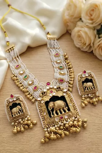 Handcrafted elephant motif gold-plated pearl necklace set - traditional ethnic jewelry for weddings & festivals