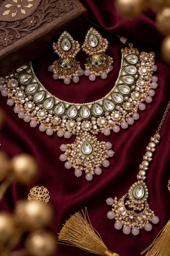 Handcrafted traditional gold-plated kundan bridal jewelry set with maang tikka & jhumka earrings