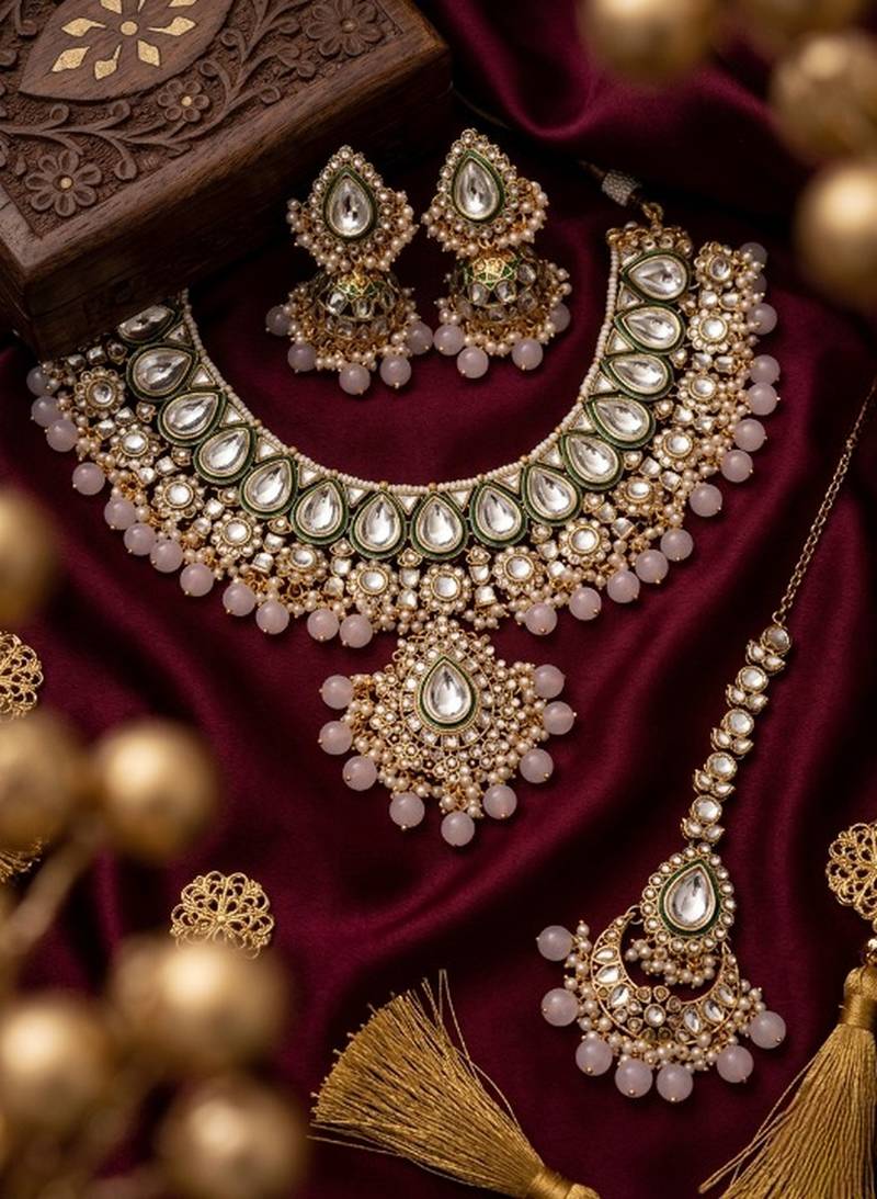 Handcrafted traditional gold-plated kundan bridal jewelry set with maang tikka & jhumka earrings