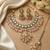 Handcrafted traditional gold-plated kundan bridal jewelry set with maang tikka & jhumka earrings