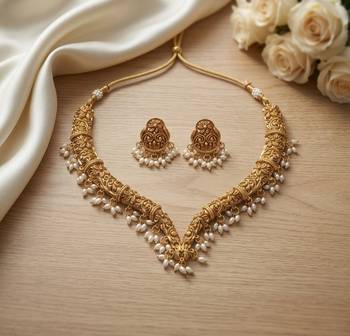 Handcrafted traditional gold-plated choker necklace set with pearl drops - ethnic jewelry for weddings 1