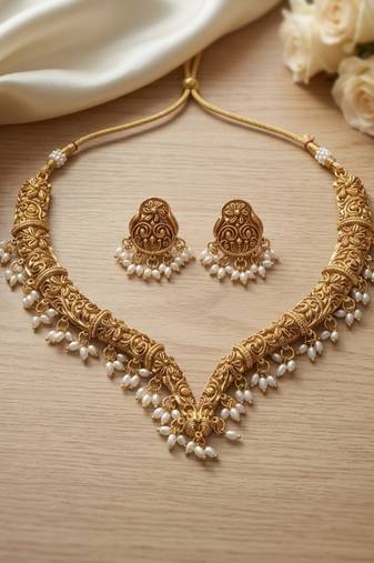 Handcrafted traditional gold-plated choker necklace set with pearl drops - ethnic jewelry for weddings