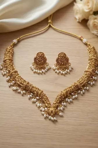 Handcrafted traditional gold-plated choker necklace set with pearl drops - ethnic jewelry for weddings