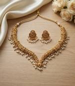 Handcrafted traditional gold-plated choker necklace set with pearl drops - ethnic jewelry for weddings