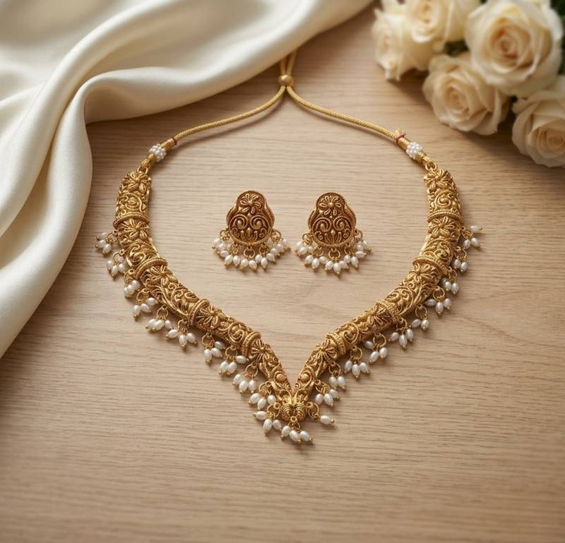 Handcrafted traditional gold-plated choker necklace set with pearl drops - ethnic jewelry for weddings