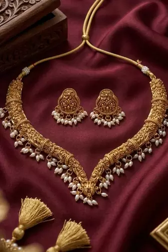 Handcrafted traditional gold-plated choker necklace set with pearl drops - ethnic jewelry for weddings