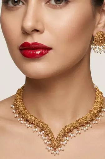 Handcrafted traditional gold-plated choker necklace set with pearl drops - ethnic jewelry for weddings