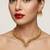 Handcrafted traditional gold-plated choker necklace set with pearl drops - ethnic jewelry for weddings