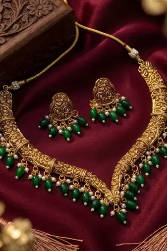 Handcrafted traditional gold-plated choker necklace set with pearl drops - ethnic jewelry for weddings