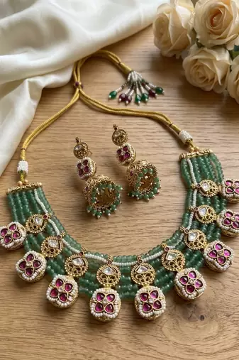 Traditional polki & green beaded choker necklace set with jhumka earrings | gold-plated ethnic bridal jewelry