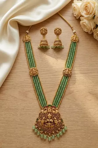 Traditional gold-plated temple jewelry haram set | green bead long necklace & jhumkas | ethnic wear