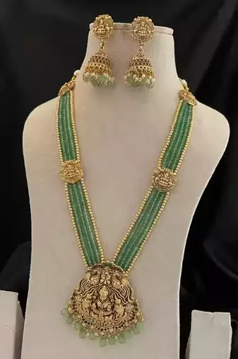 Traditional gold-plated temple jewelry haram set | green bead long necklace & jhumkas | ethnic wear