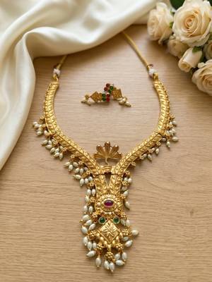 Gold plated traditional indian necklace set with pearls, ruby and emerald accents 1