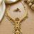 Gold plated traditional indian necklace set with pearls, ruby and emerald accents