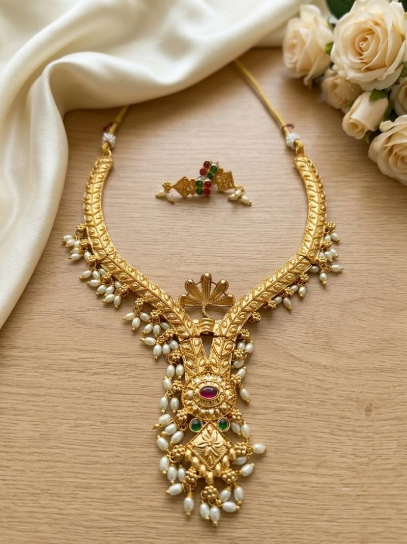 Gold plated traditional indian necklace set with pearls, ruby and emerald accents