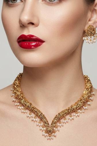 Handcrafted traditional gold-plated choker necklace set with pearl drops - ethnic jewelry for weddings