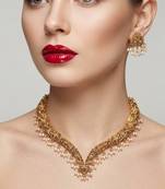 Handcrafted traditional gold-plated choker necklace set with pearl drops - ethnic jewelry for weddings