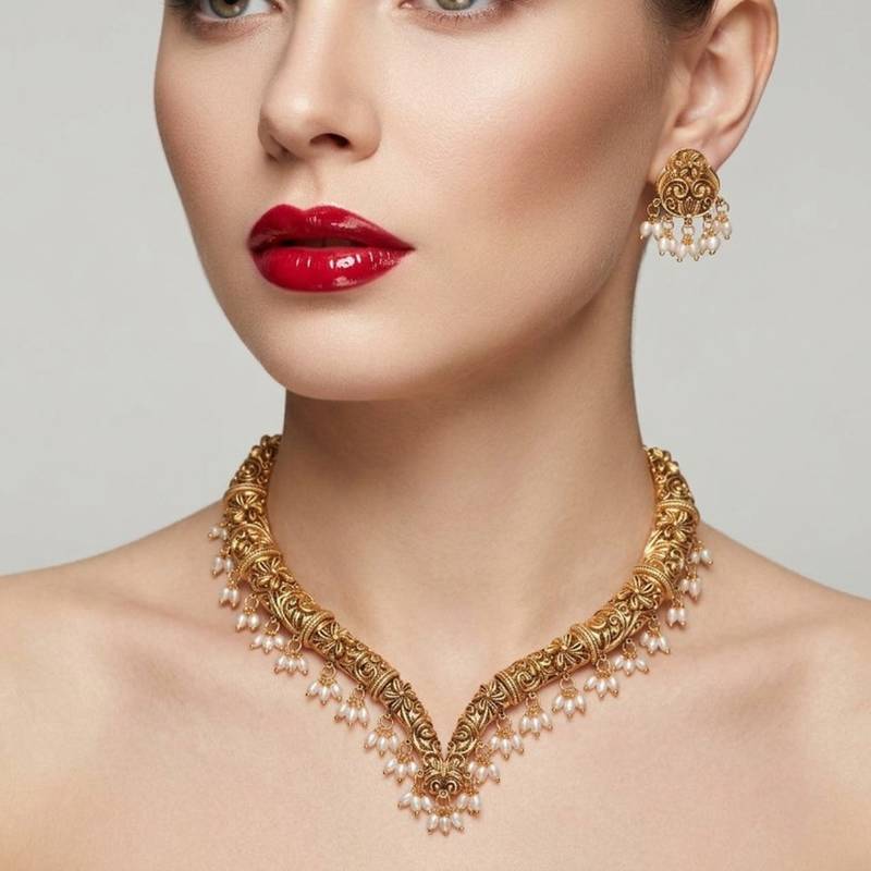 Handcrafted traditional gold-plated choker necklace set with pearl drops - ethnic jewelry for weddings