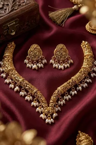 Handcrafted traditional gold-plated choker necklace set with pearl drops - ethnic jewelry for weddings