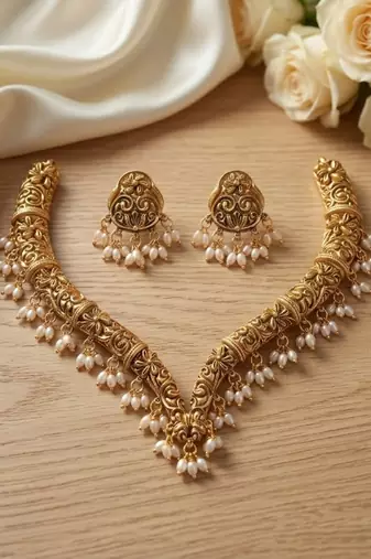 Handcrafted traditional gold-plated choker necklace set with pearl drops - ethnic jewelry for weddings