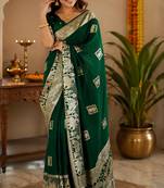 Dark bottle green soft silk geomatric buttas jacquard zari woven banarasi saree