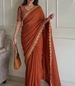 Appetizing orange embroidery cutwork work lace border rangoly silk party wear saree