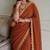 Appetizing orange embroidery cutwork work lace border rangoly silk party wear saree