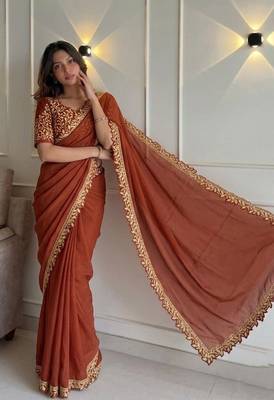 Appetizing orange embroidery cutwork work lace border rangoly silk party wear saree 4