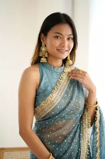 Spellbinding sea-green fancy lace border soft viscose jacquard butti silk ceremonian saree