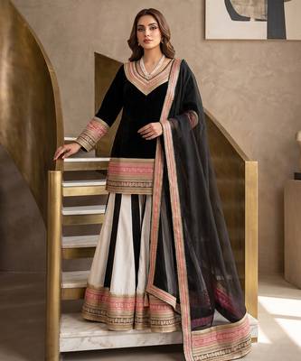Elegant black sharara suit with heavy embroidered border dupatta 1