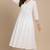 Women's white cotton handcrafted  chikankari flared kurta with embroidered yoke and 3/4 sleeves