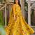 Mustard color smart and stylish partywear rayon fabric gown with dupatta