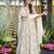 Off white color smart and stylish partywear rayon fabric gown with dupatta