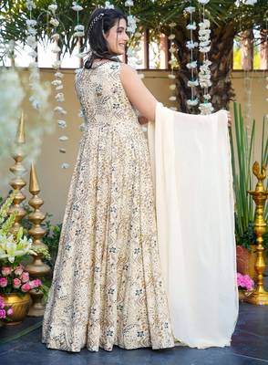 Off white color smart and stylish partywear rayon fabric gown with dupatta 2