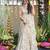 Off white color smart and stylish partywear rayon fabric gown with dupatta