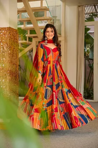 Red color smart and stylish partywear rayon fabric gown with dupatta