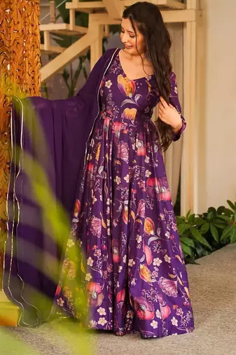 Purple color smart and stylish partywear rayon fabric gown with dupatta
