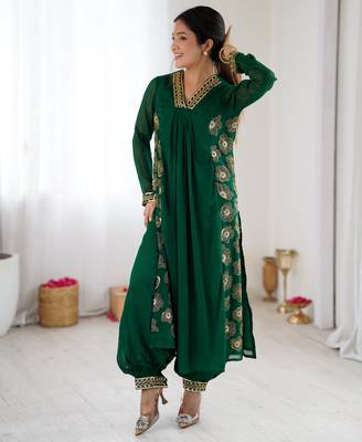 Dark green color designer partywear attire for trendy ceremonial looks 1