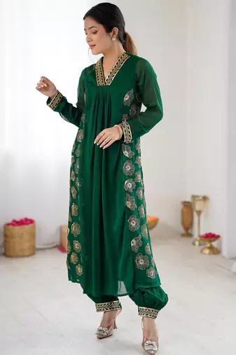 Dark green color designer partywear attire for trendy ceremonial looks