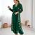Dark green color designer partywear attire for trendy ceremonial looks